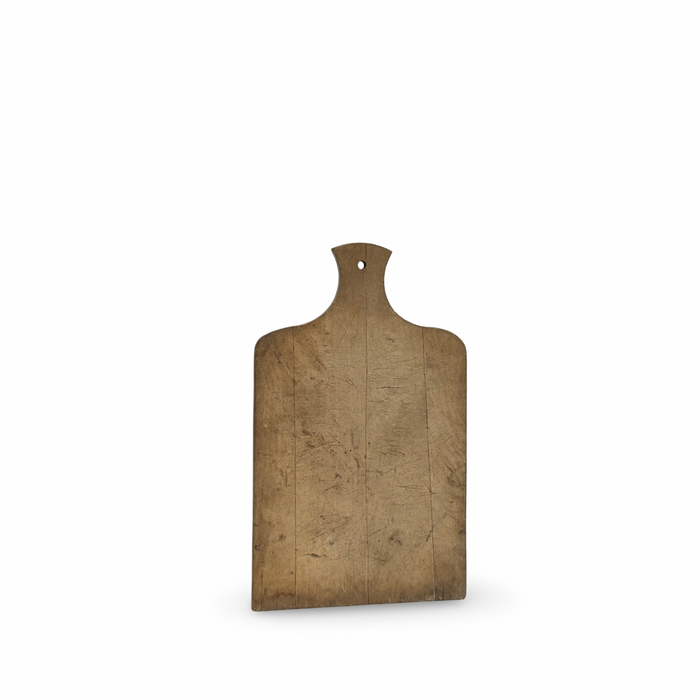 Antique wooden bread board with rounded top notch and hanging hole