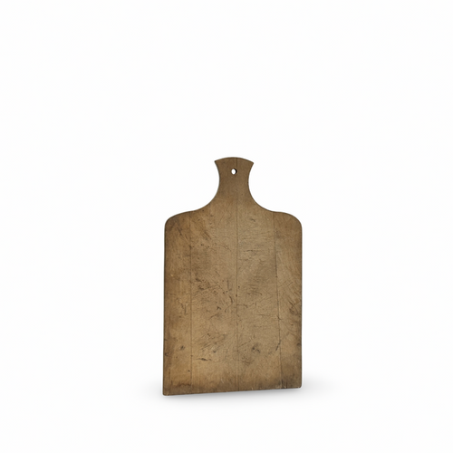 Antique wooden bread board with rounded top notch and hanging hole