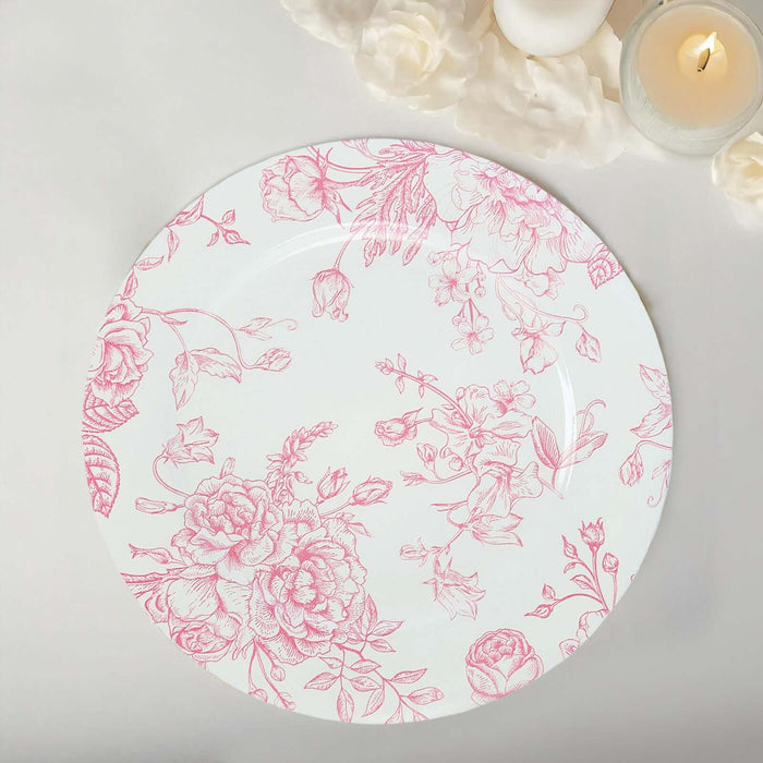 Floral design ceramic plate with pink accents on a white background.