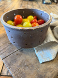 Vintage French cheese mold, blue perforated bowl holding small tomatoes
