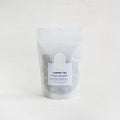 Herbal tea blend pouch with printed label, clear plastic bag