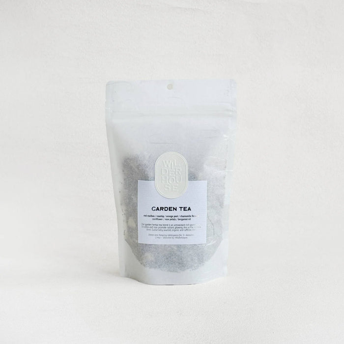 Herbal tea blend pouch with printed label, clear plastic bag