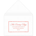 Bamboo rectangle holding block and script coral return address on a white envelope.