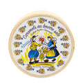 Round cardboard tin lid with illustrated label for salted butter caramels
