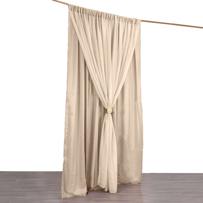 Beige curtain draped and tied back, showcasing its full shape against a white background