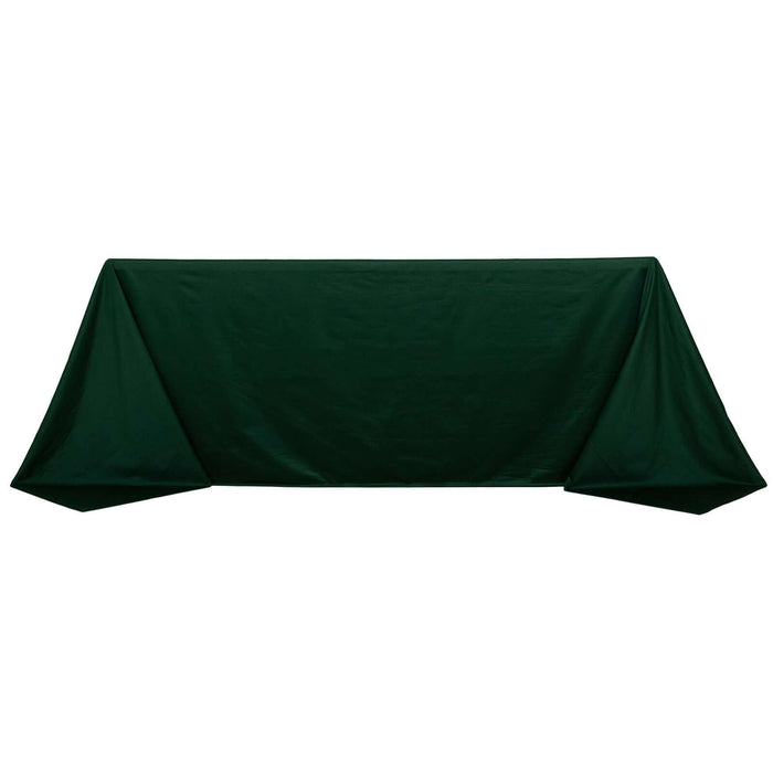 Green tablecloth draped elegantly over a table