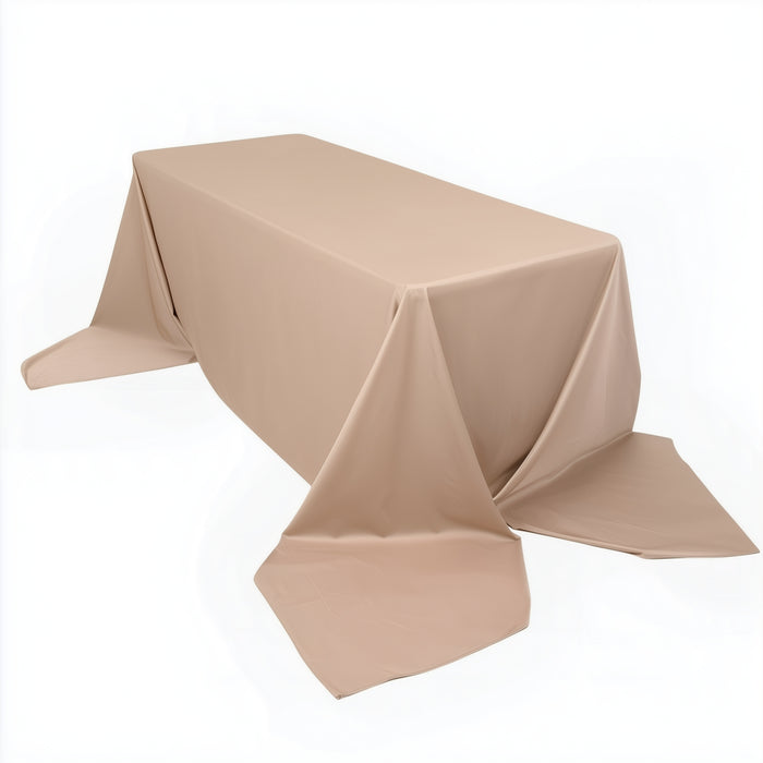 Beige tablecloth draped elegantly over a rectangular table