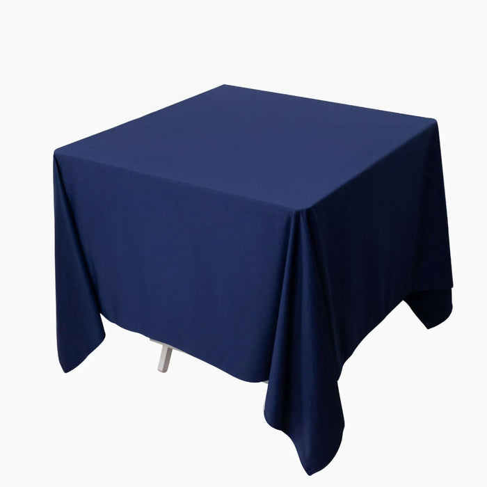 Navy blue square tablecloth on a white background